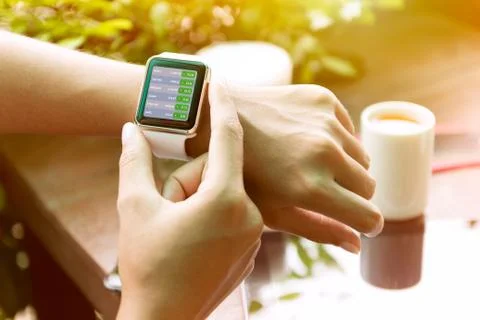 Closeup hand using watch check stock finance Foto stock