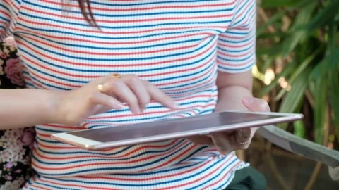 Closeup hand of woman using tablet. Stock Footage 135333659