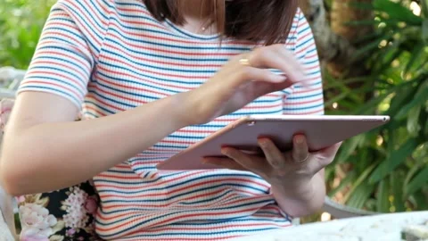 Closeup hand of woman using tablet. Stock Footage 135333664