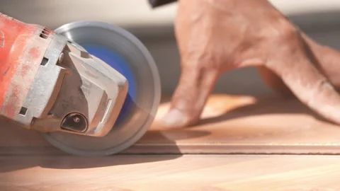 Closeup hand worker use cutting machine cut tile ceramic on slow motion video Stock Footage 221598987