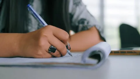 Closeup of hand writing on paper Stock Footage 252575674