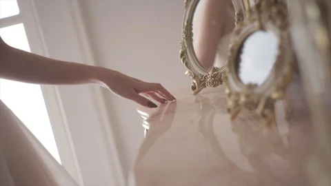 Closeup hands of the bride in luxurious interior near the mirror. Bridal Morning Video stock 103398771