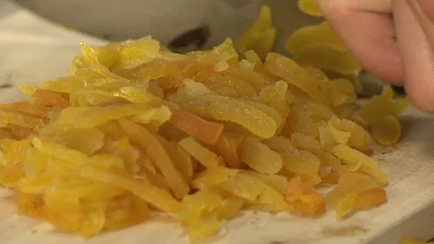 Closeup of hands chopping pear for cooking tart Video stock 87855155