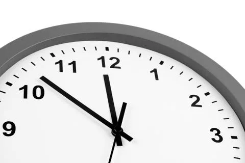 Closeup of hands on clock face Stock Photos