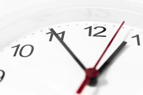 Closeup of hands on clock face.sensitive focus Stock Photos