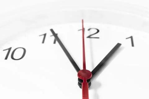 Closeup of hands on clock face.sensitive focus Stock Photos
