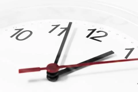 Closeup of hands on clock face.sensitive focus Stock Photos