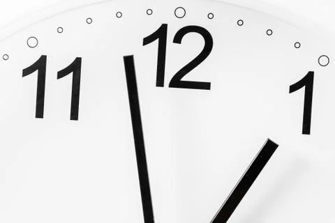 Closeup of hands on clock face.sensitive focus Stock Photos