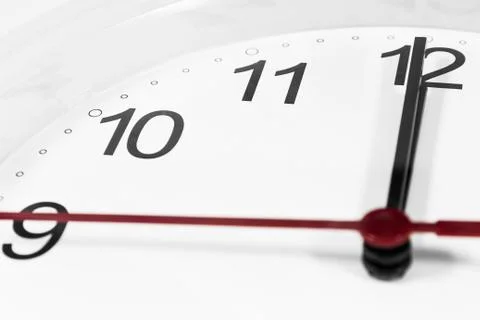 Closeup of hands on clock face.sensitive focus Stock Photos