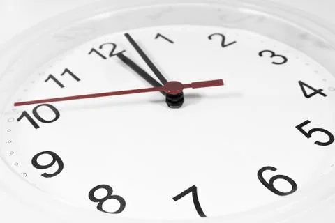 Closeup of hands on clock face.sensitive focus Stock Photos