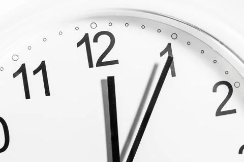 Closeup of hands on clock face.sensitive focus Stock Photos