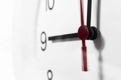 Closeup of hands on clock face.sensitive focus Stock Photos
