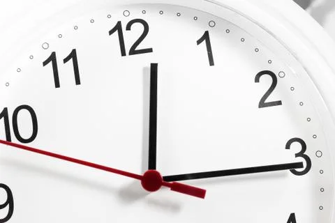 Closeup of hands on clock face.sensitive focus Stock Photos