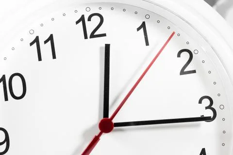 Closeup of hands on clock face.sensitive focus Stock Photos