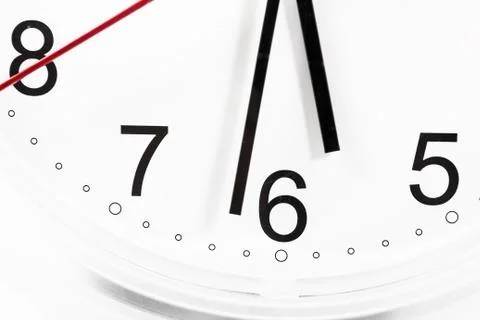Closeup of hands on clock face.sensitive focus Stock Photos