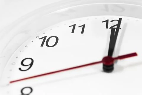 Closeup of hands on clock face.sensitive focus Stock Photos