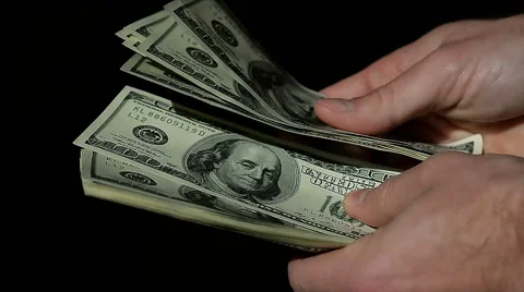 Closeup Hands Count Hundred Dollar Bills on Black Background 스톡 동영상 61477082