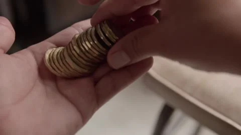 Closeup of Hands Counting Mexican Peso Coins for Cash Payment and Savings Stock Footage 340805622