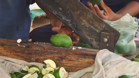 Closeup Of Hands Cutting Ripe Green Mangoes Sliced For Making Pickle Stock Footage 281088237