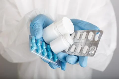 Closeup of hands in gloves with tablets Stock Photos