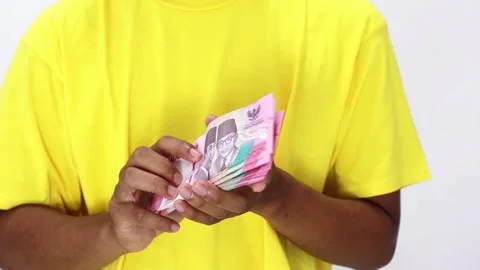 Closeup Hands Holding Currency Notes Yellow Shirt White Background Stock Footage 307048991