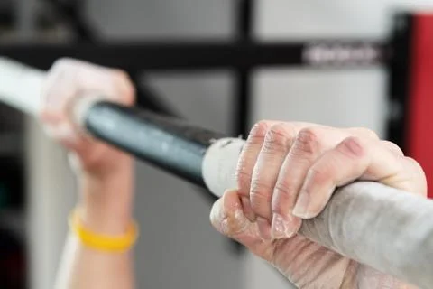 Closeup of hands holding a pull-ups bar Foto stock
