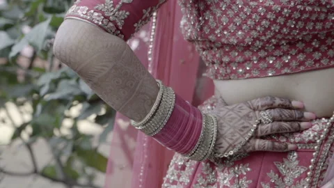Closeup of hands Indian Bride getting ready for her traditional Indian Wedding Stock Footage 170871398
