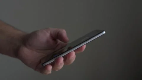 Closeup hands of man using smartphone Stock Footage 144819713