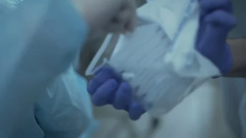 Closeup of the hands of nurses removed from the packing pump to respirator. avl Stock-Footage 70793590