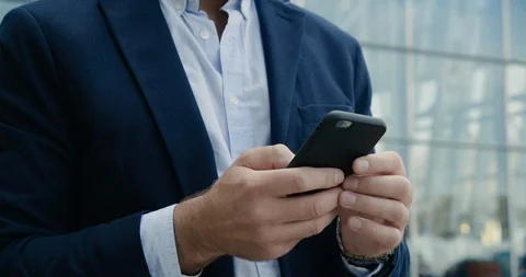 Closeup Hands with Phone are texting Messages on Smartphone. Attractive Stock Footage 124016405