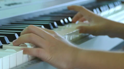 Closeup hands playing electone Stock Footage 53093004