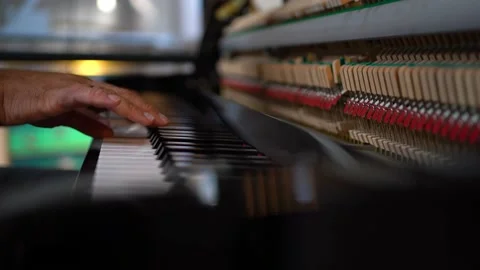 Closeup on hands playing piano. Stock Footage 218221651
