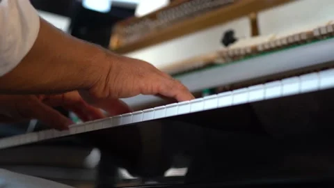 Closeup on hands playing piano. Stock Footage 218221713