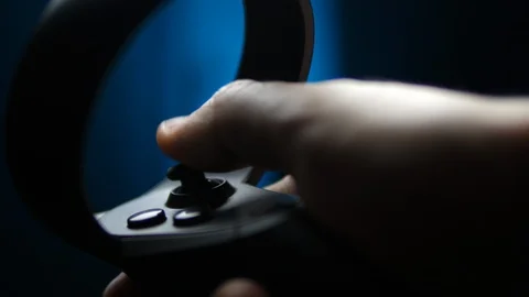 Closeup Hands POV gamer playing in Virtual Reality with VR Controller 스톡 동영상 112831763