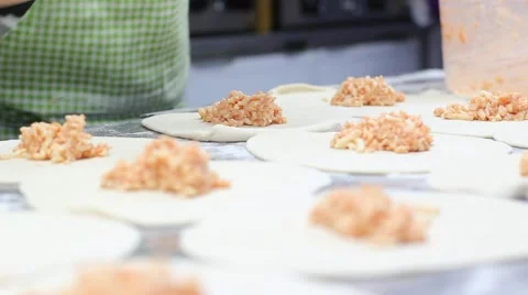 Closeup of hands that prepare stuffed pasta Stock Footage 64436791