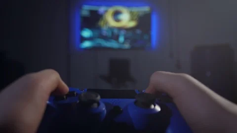 Closeup hands pressing buttons on game controller Video stock 103870490