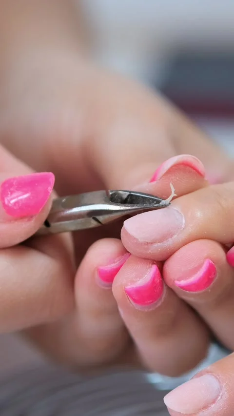 Closeup Hands Removing Cuticles With Professional Nail Tool, Metal Clippers.. Stock Footage 285706036