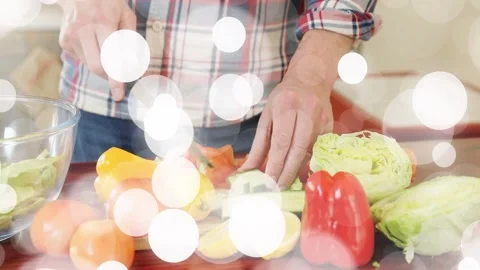 Closeup hands slicing cucumber, man chopping with knife into bowl for salad, Stock Footage 334178280