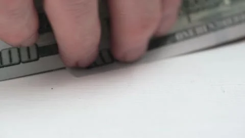 Closeup hands taking stack of hundred dollar bills from table. business concept. Stock Footage 256015561