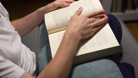 Closeup of hands turning page of book Stock Footage 201283337