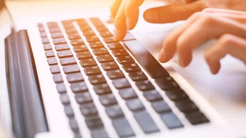 Closeup of hands typing on keyboard, working on computer Stock Footage 93643856