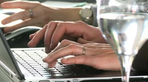 Closeup of hands typing on a laptop Stock Footage 45705561
