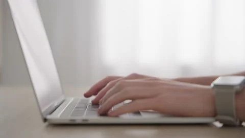 Closeup of hands typing on laptop Stock Footage 234292619
