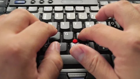 Closeup of hands typingworking on a laptop computer keyboard with black keys 库存影片 279286200