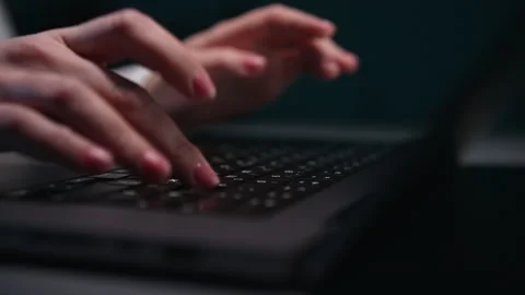 Closeup of hands of unrecognizable female hacker programmer working typing on Stock-Footage 275239984