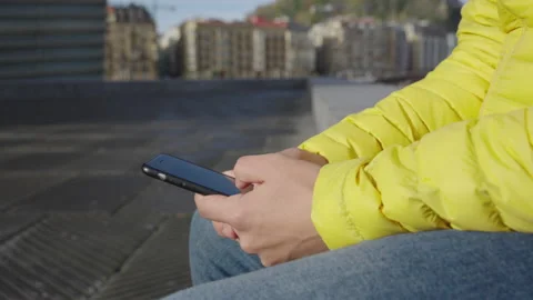 Closeup of hands using phone Stock Footage 222570580