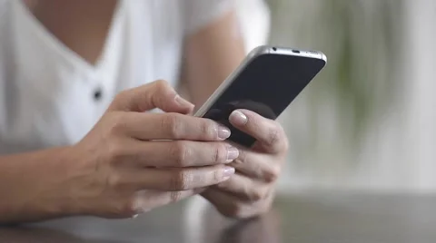 Closeup of hands using smartphone Stock Footage 65498549
