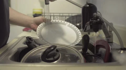 Closeup of hands washing dishes, flat image, 24FPS Vídeo Stock 54093917