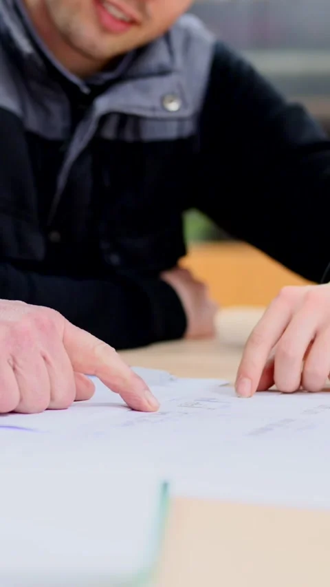 Closeup of hands working on a document Video stock 273117847