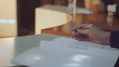 Closeup of Hands writing on paper Stock Footage 249473299